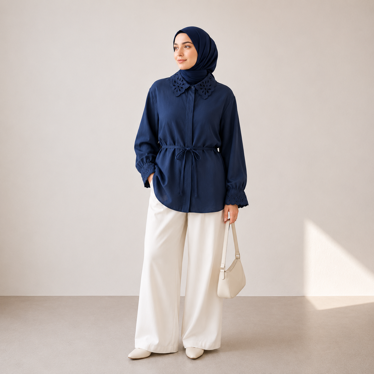navy blue shirt with embroidered collar and cuff details